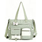 Bolso tote de lona con gran capacidad y múltiples bolsillos